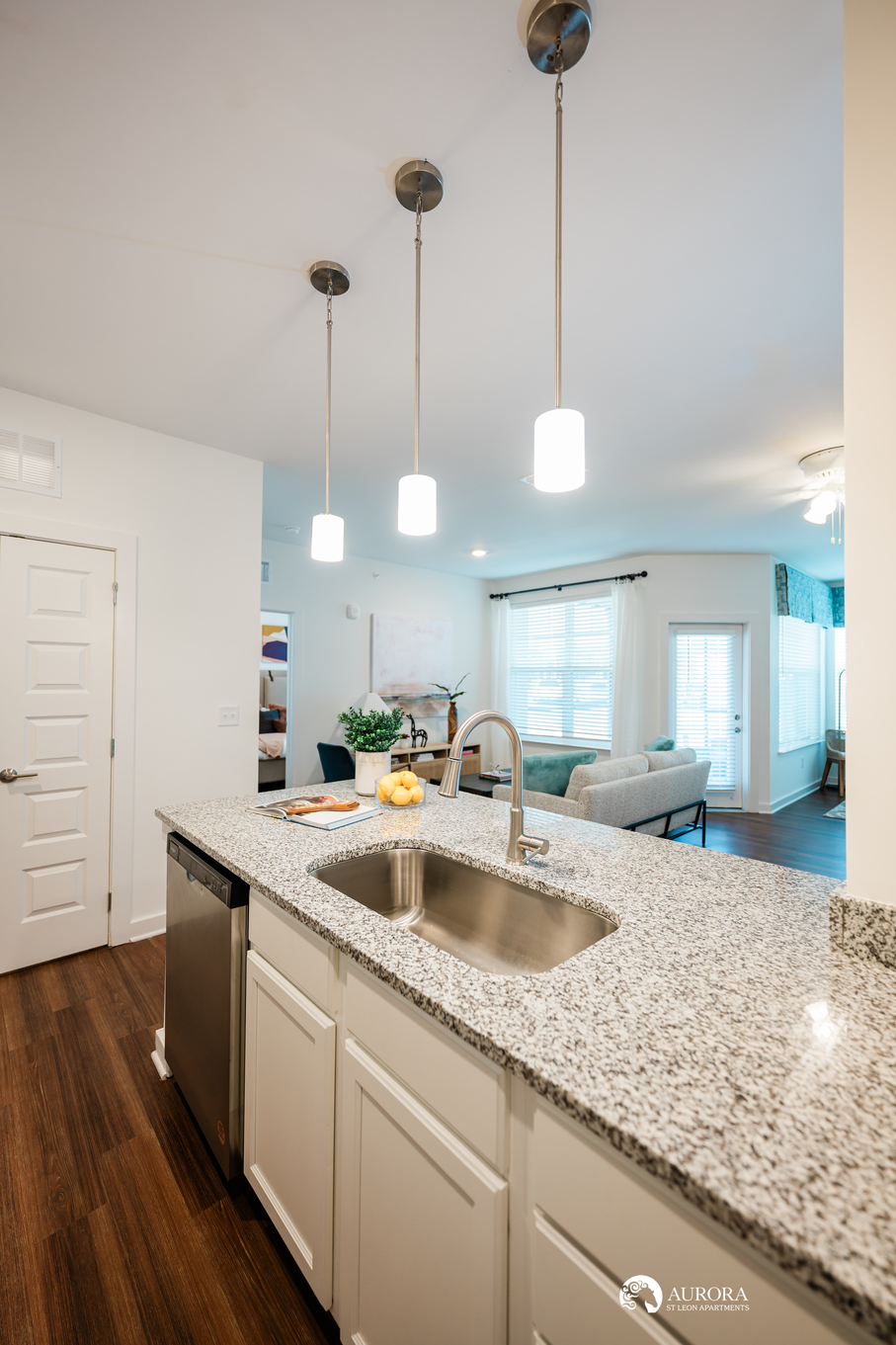 A kitchen with granite counter tops, stainless steel appliances, and 42 Apartment Property Management.